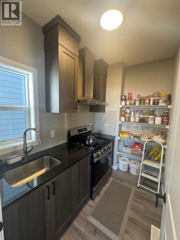 Single Family House for Sale in  Lucas Gardens NW Livingston Calgary 