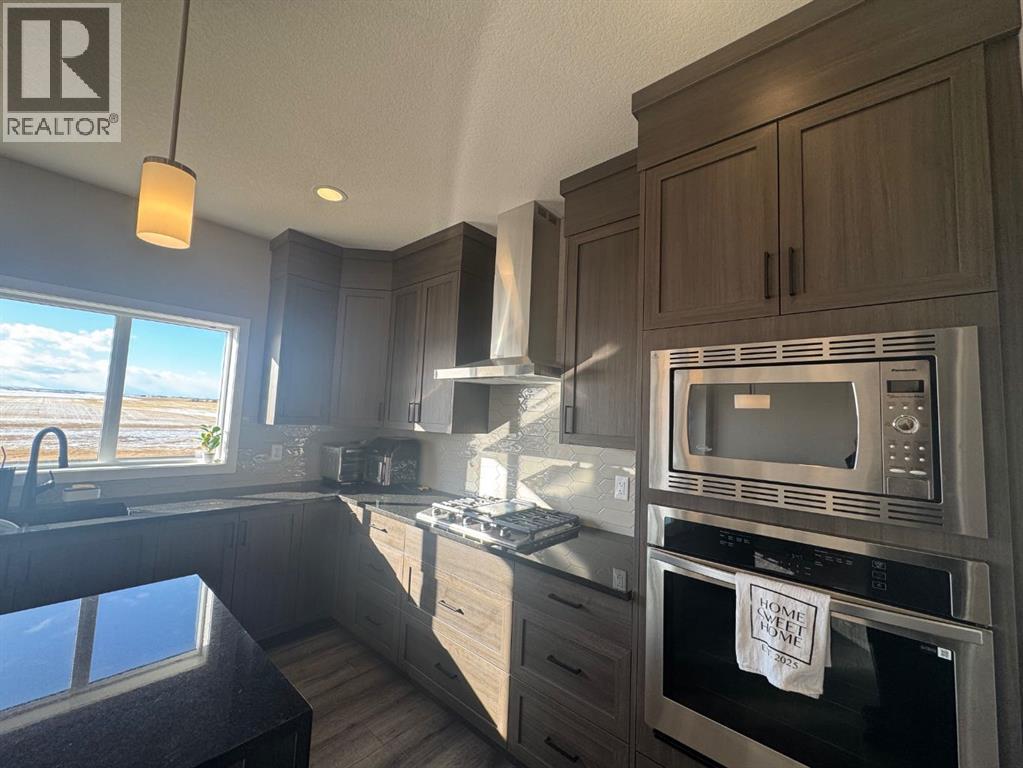 Single Family House for Sale in  Lucas Gardens NW Livingston Calgary 