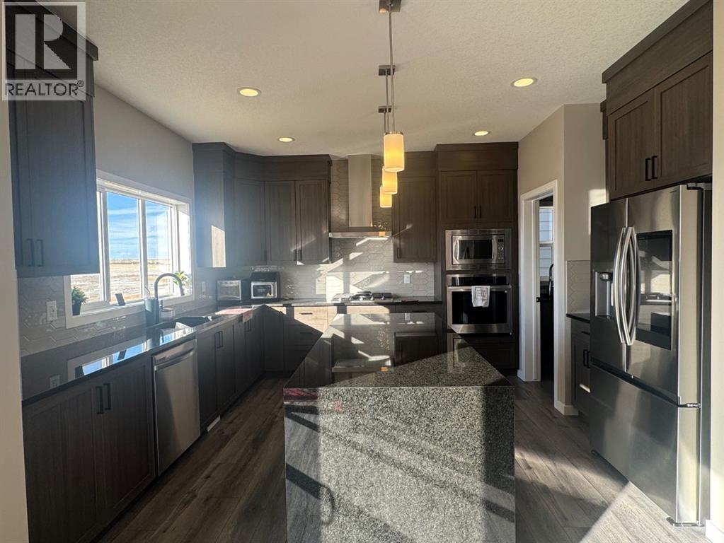 Single Family House for Sale in  Lucas Gardens NW Livingston Calgary 