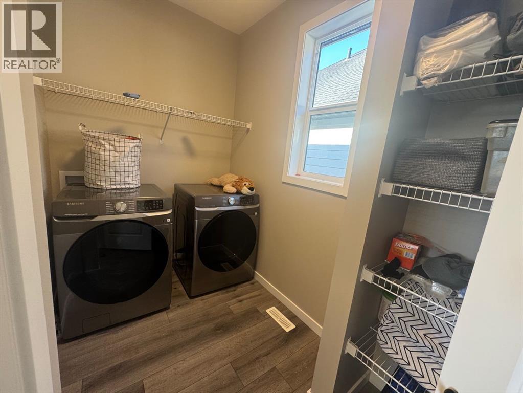 Single Family House for Sale in  Lucas Gardens NW Livingston Calgary 