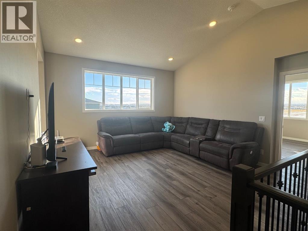 Single Family House for Sale in  Lucas Gardens NW Livingston Calgary 