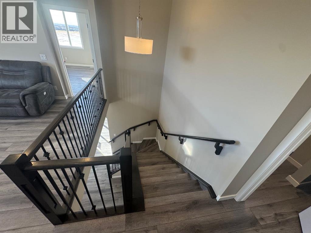 Single Family House for Sale in  Lucas Gardens NW Livingston Calgary 