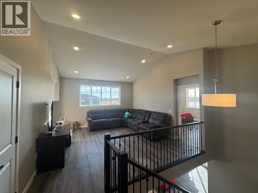 Single Family House for Sale in  Lucas Gardens NW Livingston Calgary 