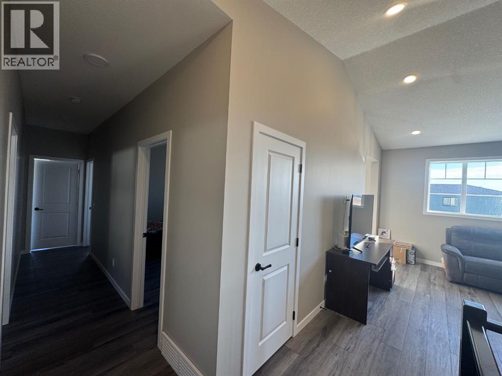 Single Family House for Sale in  Lucas Gardens NW Livingston Calgary 