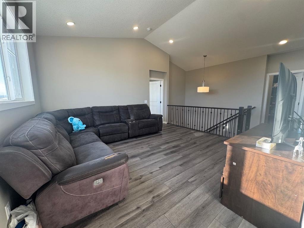 Single Family House for Sale in  Lucas Gardens NW Livingston Calgary 