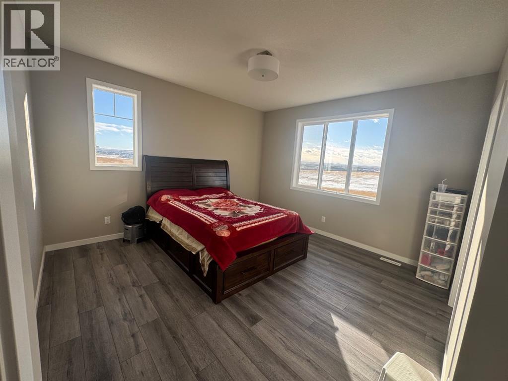 Single Family House for Sale in  Lucas Gardens NW Livingston Calgary 