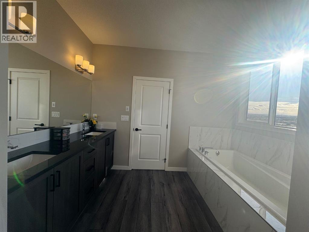 Single Family House for Sale in  Lucas Gardens NW Livingston Calgary 