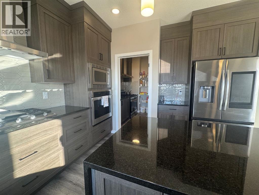 Single Family House for Sale in  Lucas Gardens NW Livingston Calgary 