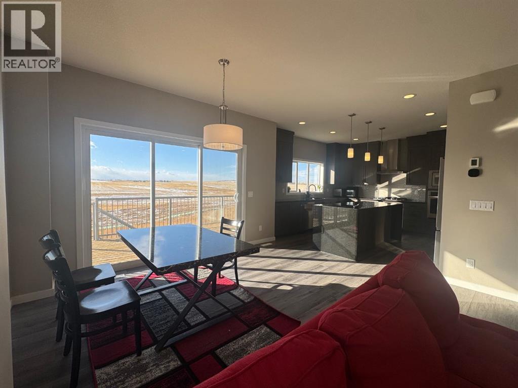 Single Family House for Sale in  Lucas Gardens NW Livingston Calgary 