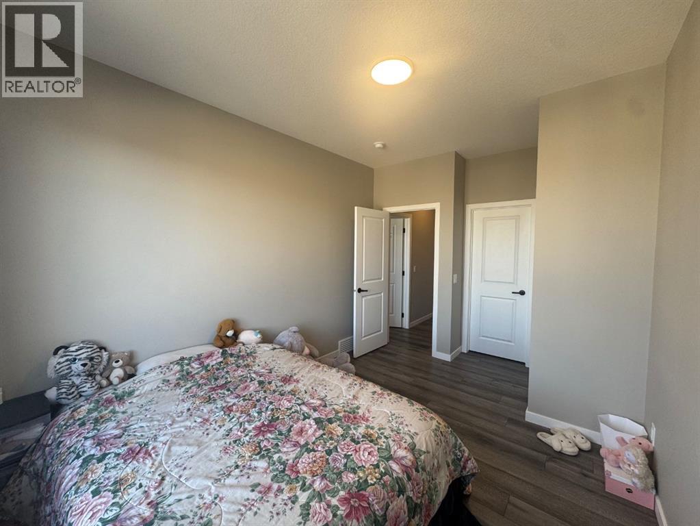 Single Family House for Sale in  Lucas Gardens NW Livingston Calgary 