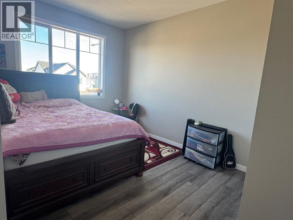 Single Family House for Sale in  Lucas Gardens NW Livingston Calgary 