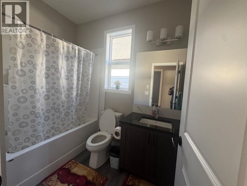 Single Family House for Sale in  Lucas Gardens NW Livingston Calgary 