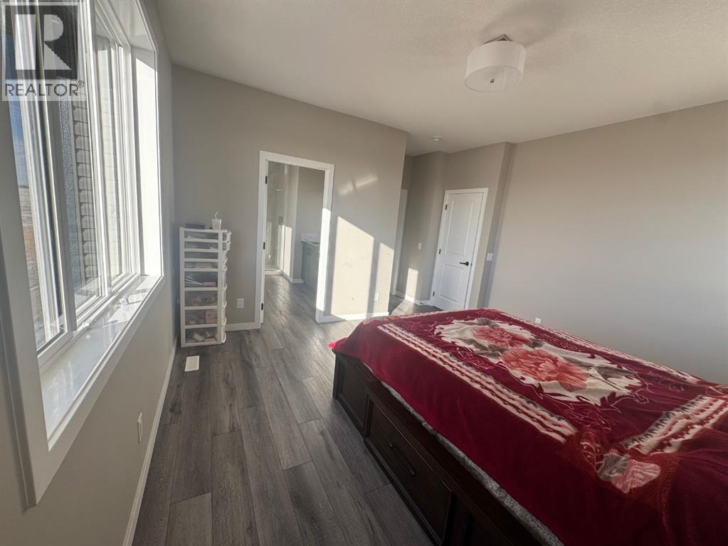 Single Family House for Sale in  Lucas Gardens NW Livingston Calgary 