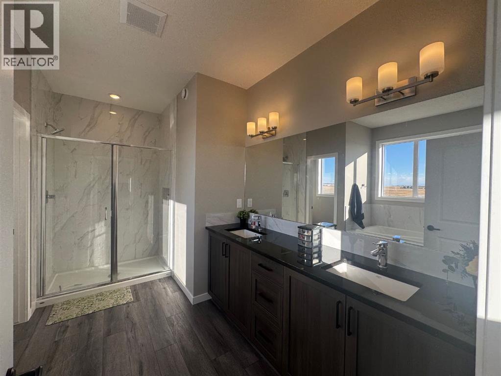 Single Family House for Sale in  Lucas Gardens NW Livingston Calgary 