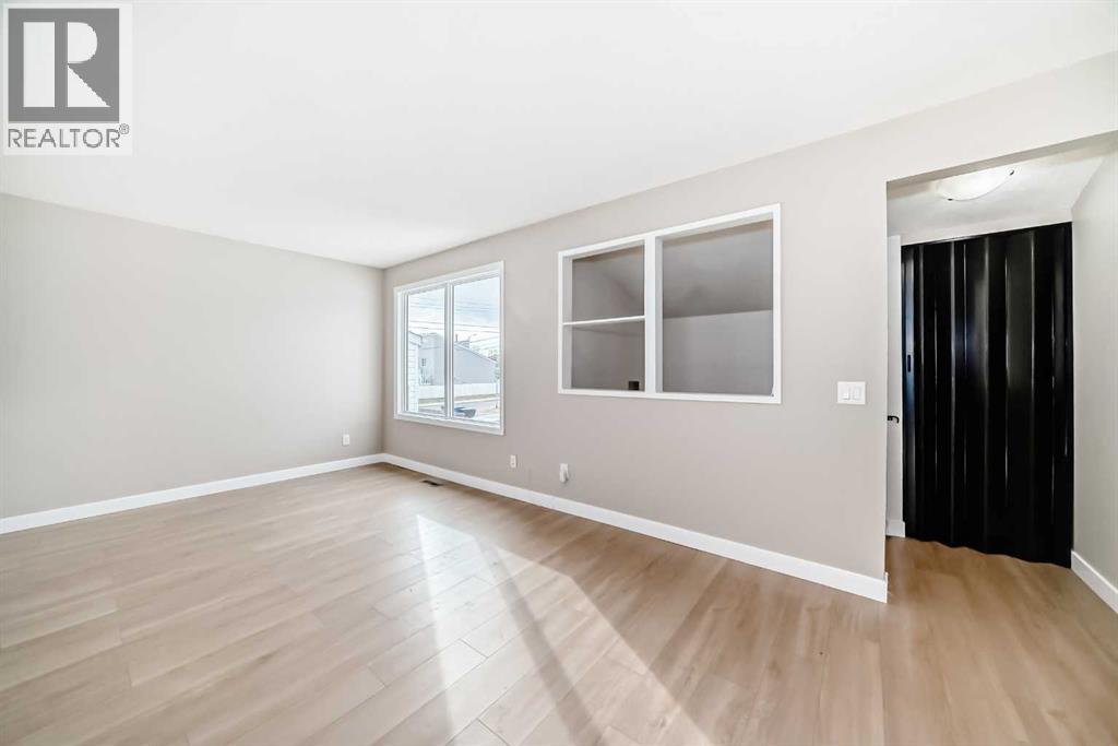 Single Family House Bi-level for Sale in  A Street SE Penbrooke Meadows Calgary 