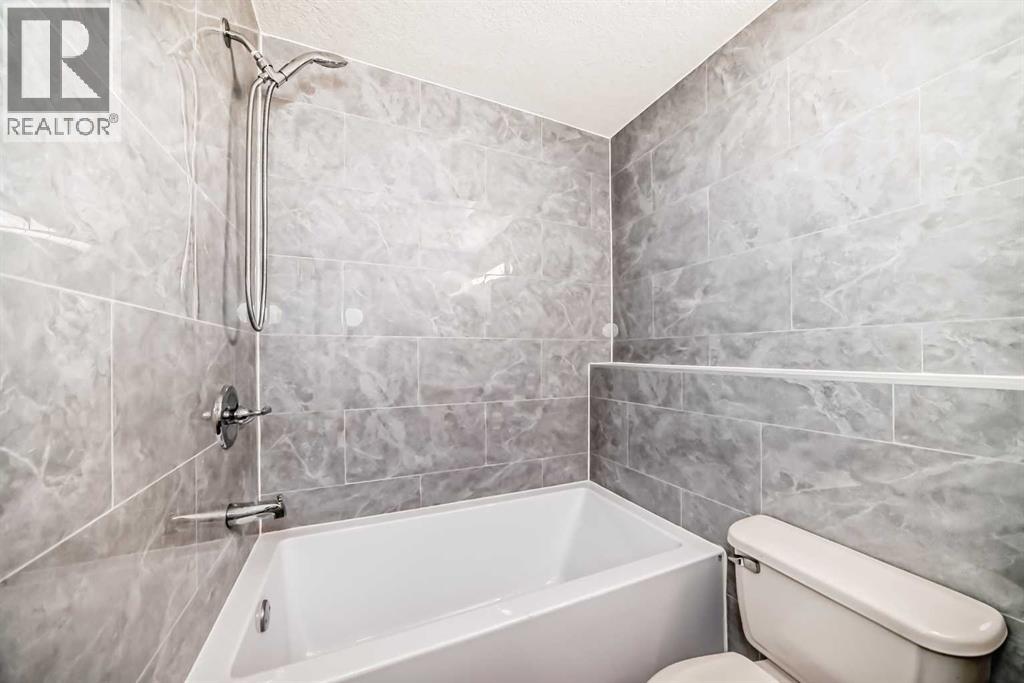 Single Family House Bi-level for Sale in  A Street SE Penbrooke Meadows Calgary 