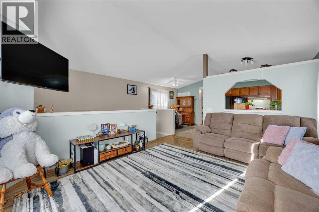 Single Family House Bi-level for Sale in  Applebrook Circle SE Applewood Park Calgary 