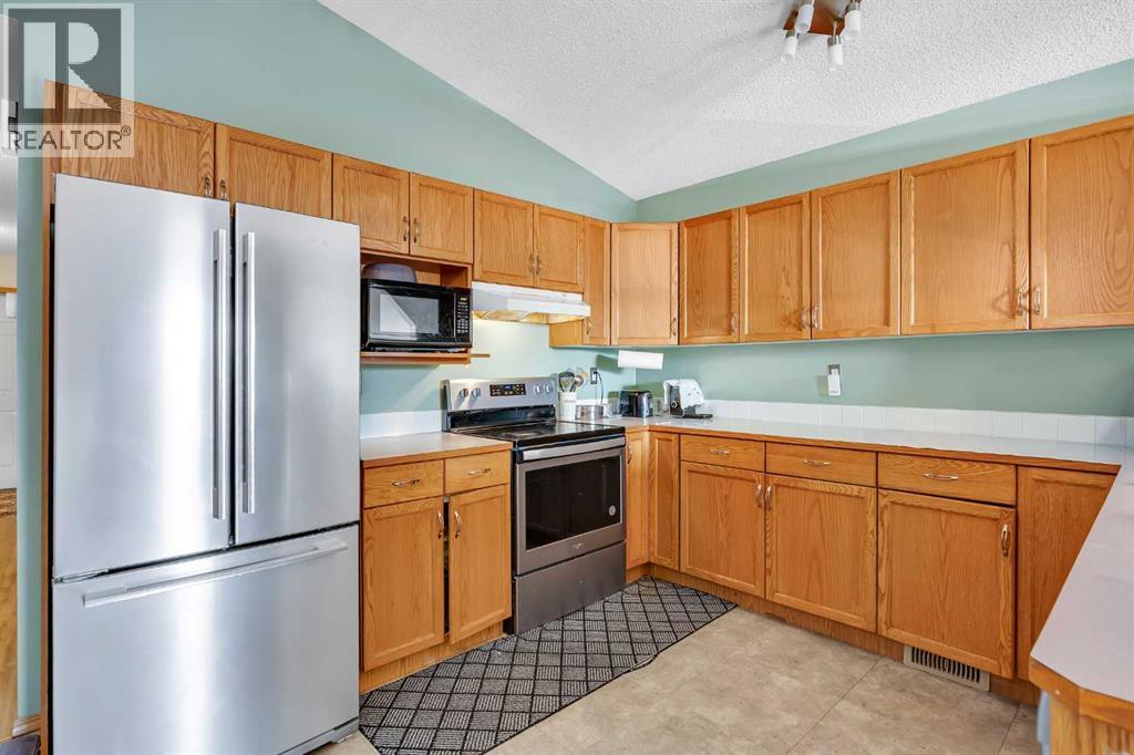 Single Family House Bi-level for Sale in  Applebrook Circle SE Applewood Park Calgary 