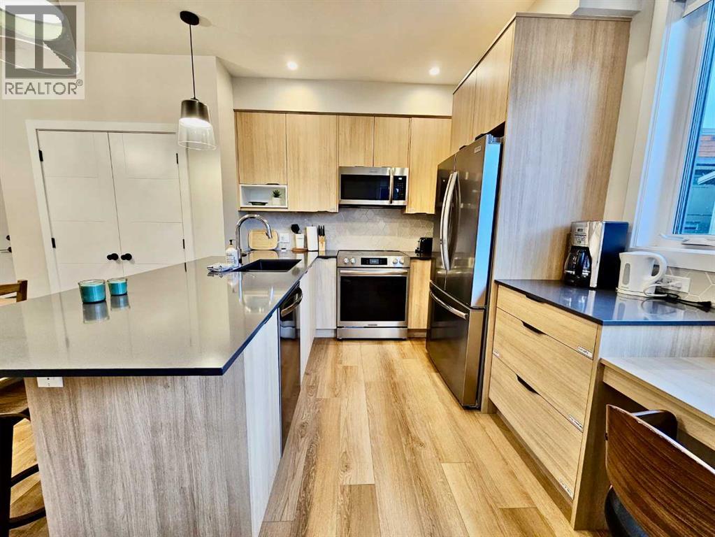 202I, 209 Stewart Creek Rise - Photo 4 of 13, Canmore, Alberta