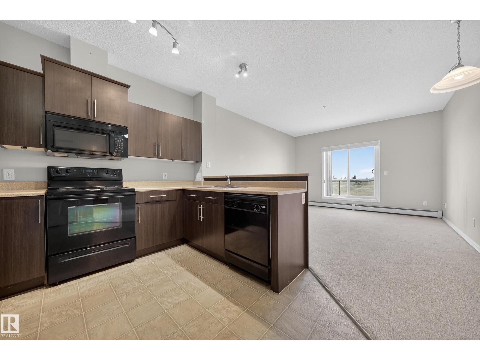 
          434 263 MACEWAN Road SW
            <br/>
            <span>Edmonton</span>
            , 
            <span>AB</span>
             <span>T6W0C4</span>
         - Photo 40