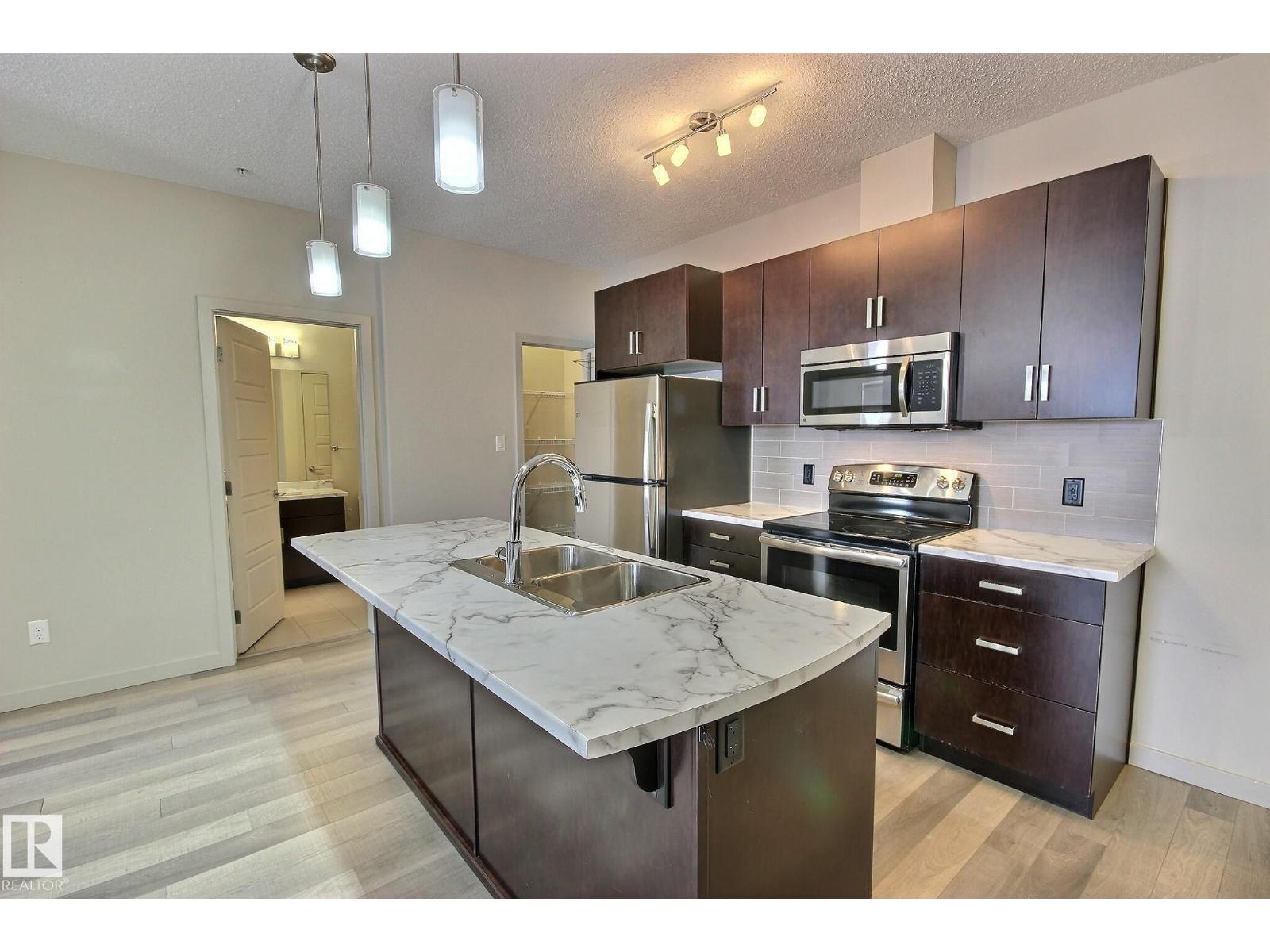 #104 320 AMBLESIDE LINK LI SW - Main photo, Edmonton, Alberta