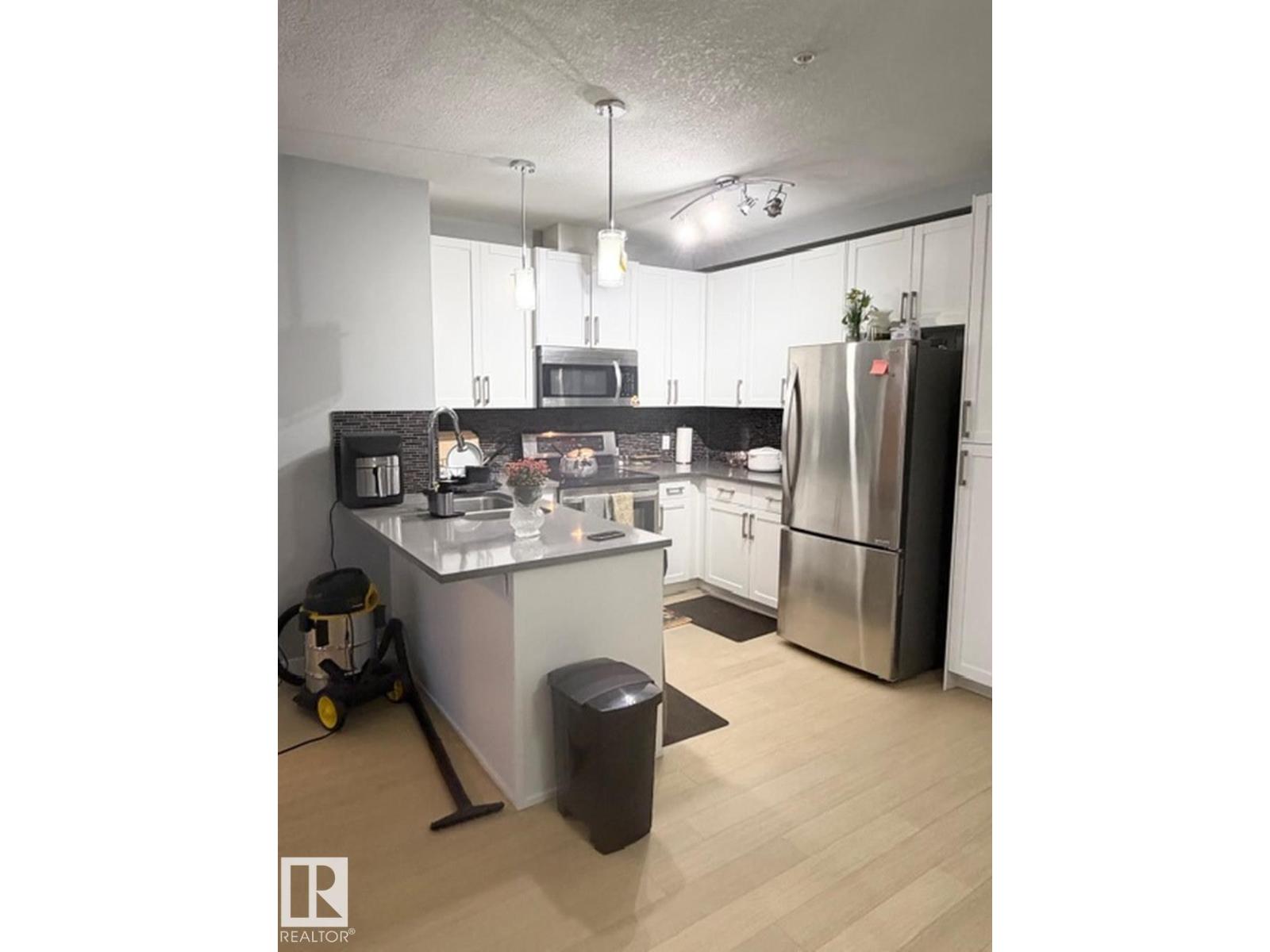 #706 5151 WINDERMERE BV SW - 3