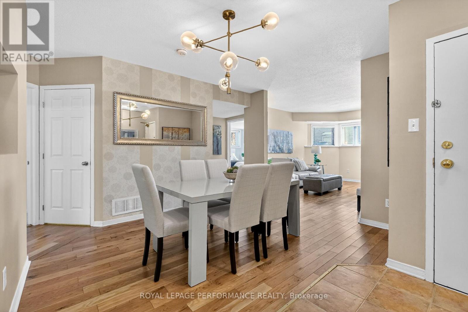 The front foyer welcomes you into this bright unit