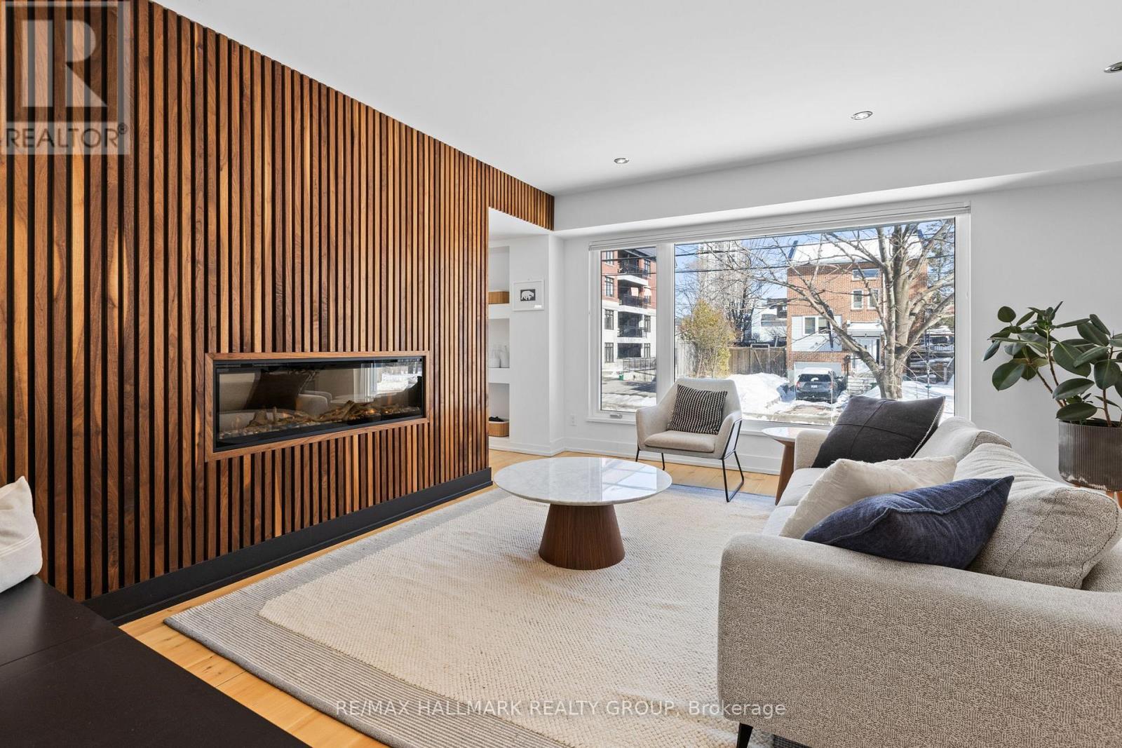 Living room with wood feature wall
