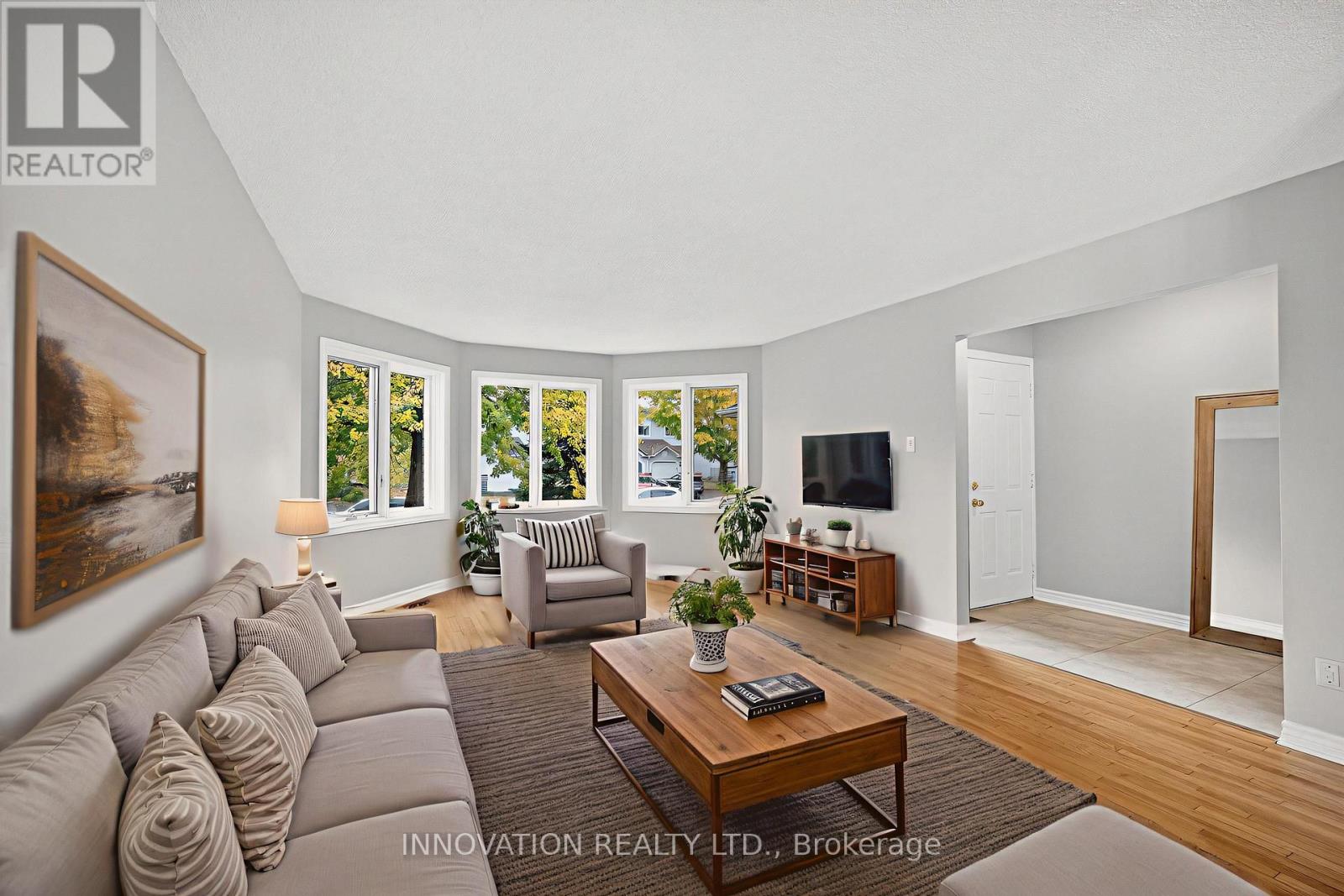 Virtually staged Living Room & foyer