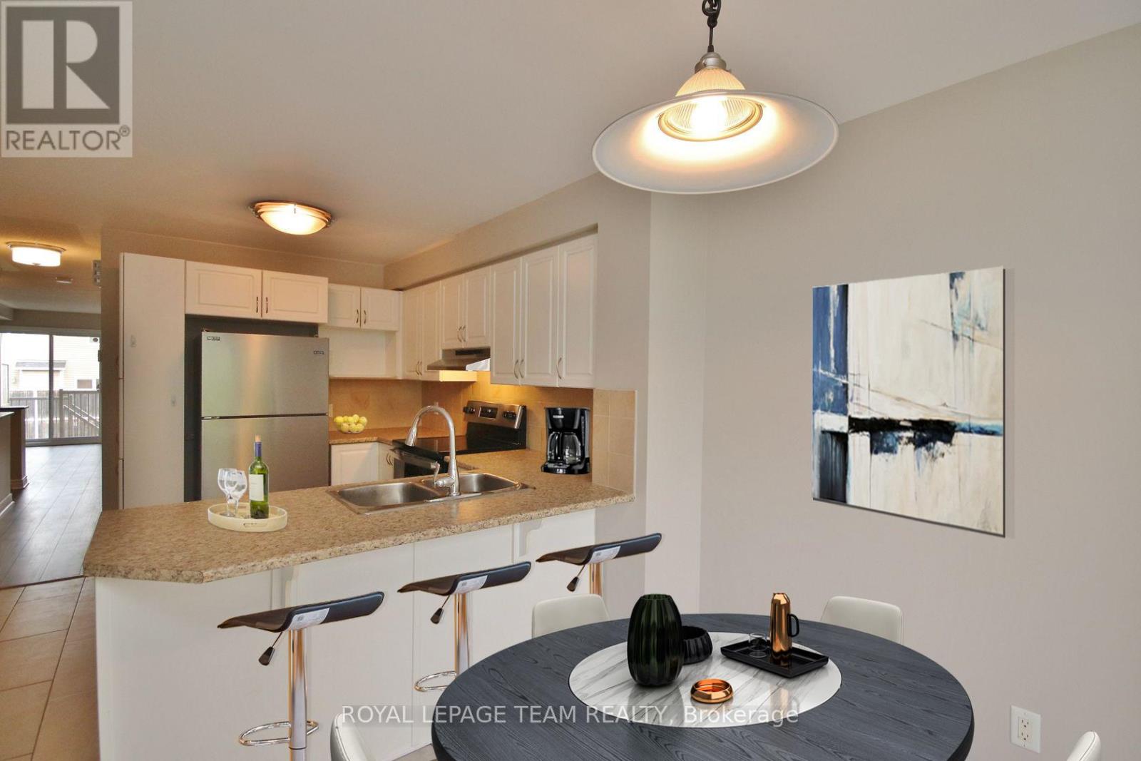 Kitchen and Breakfast area - Virtually Staged