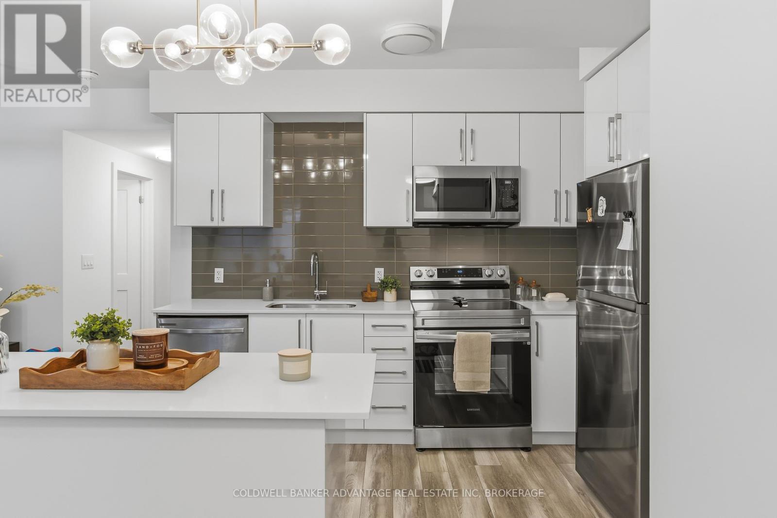 103 - 6065 MCLEOD ROAD