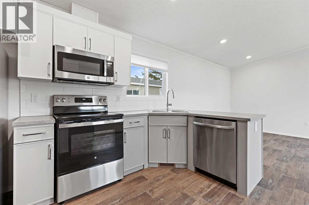 Single Family House Mobile Home for Sale in    Avenue SE Red Carpet Calgary 