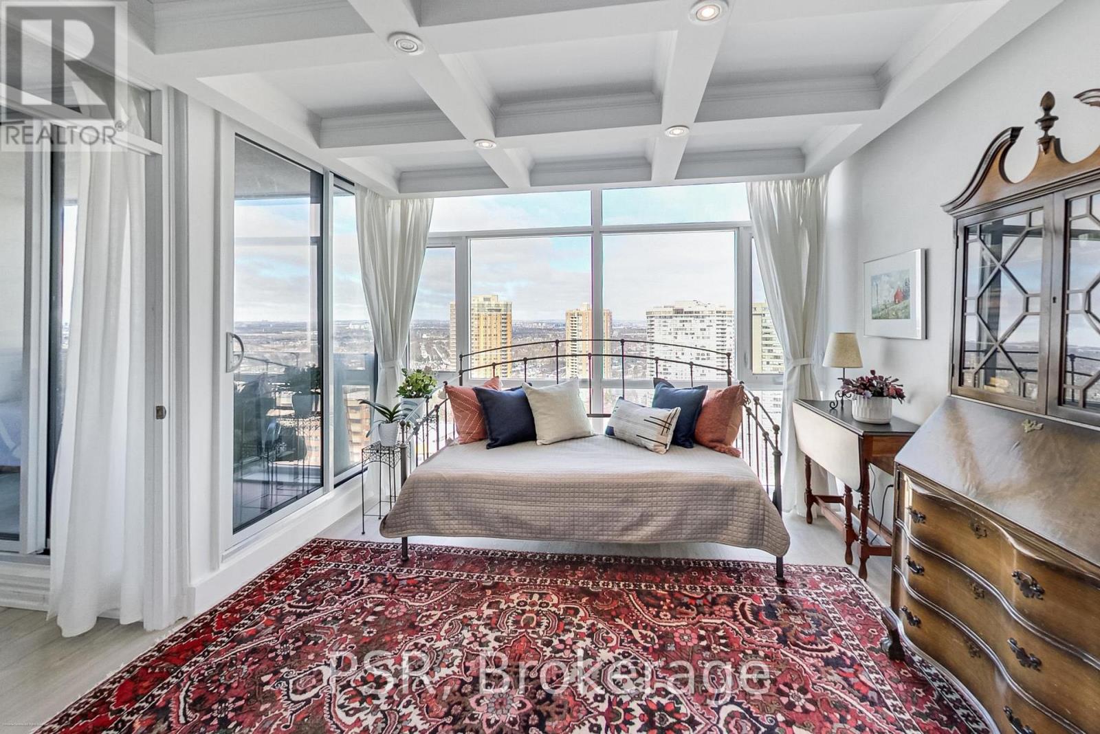 Den with coffered ceilings