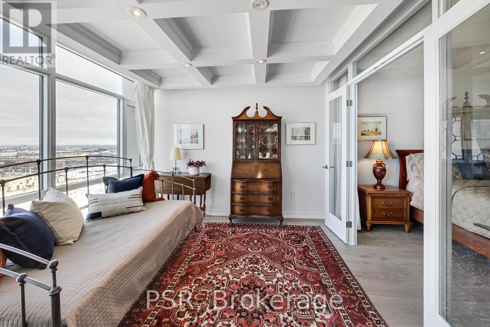 Den with coffered ceilings