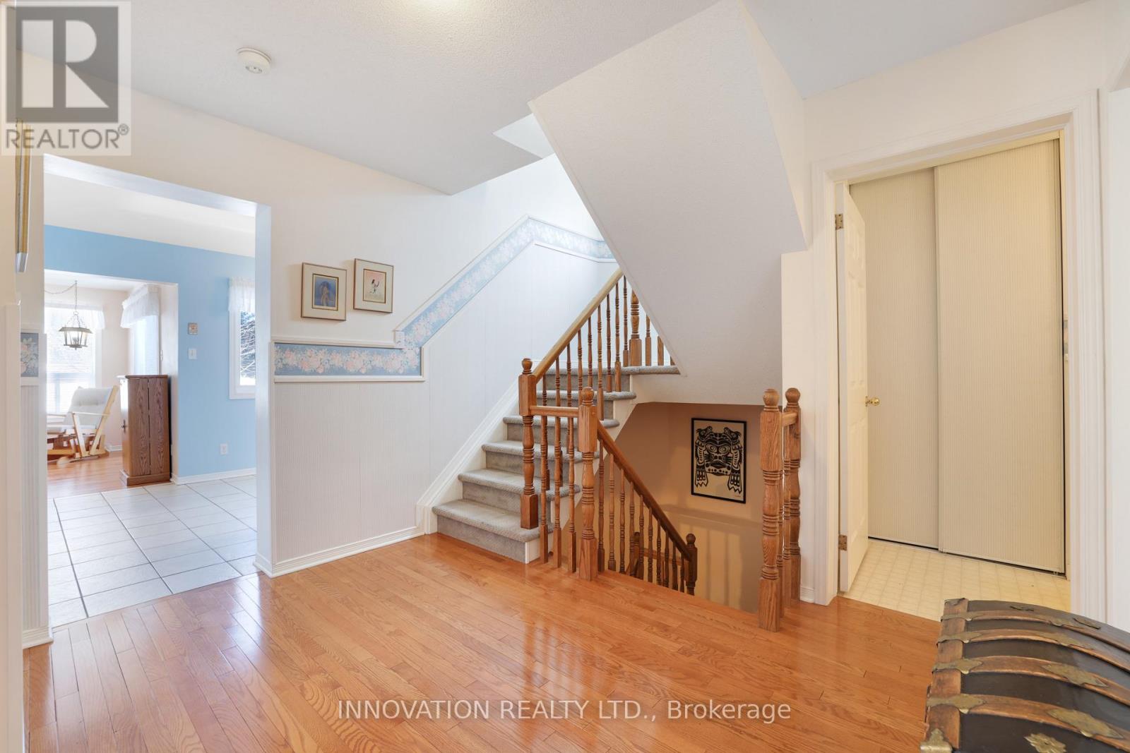 Foyer opens to spacious landing w/access to L/D/K