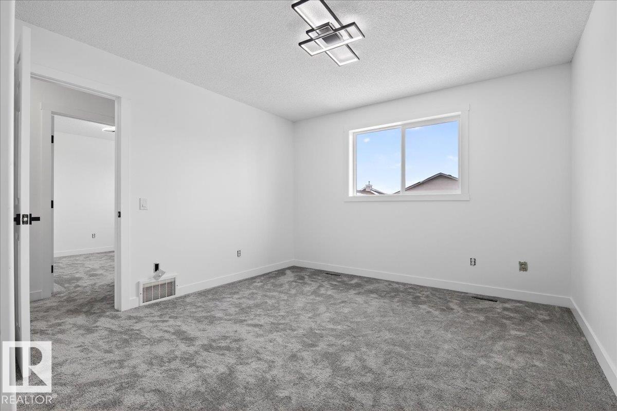 
          8916 175 AV NW
            <br/>
            <span>Edmonton</span>
            , 
            <span>AB</span>
             <span>T5Z3X9</span>
         - Photo 31