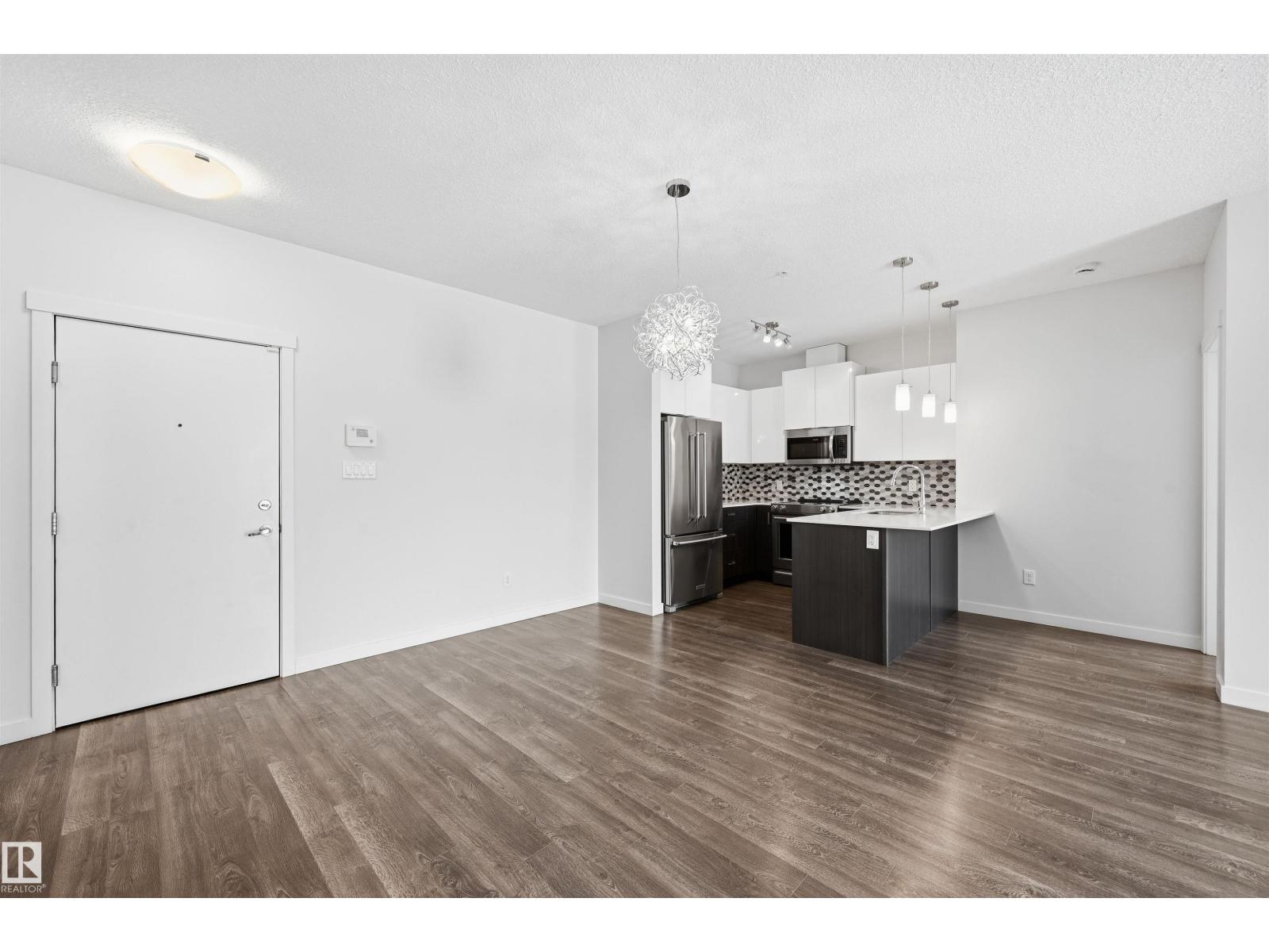 
          106 812 WELSH Drive SW
            <br/>
            <span>Edmonton</span>
            , 
            <span>AB</span>
             <span>T6X1Y7</span>
         - Photo 11