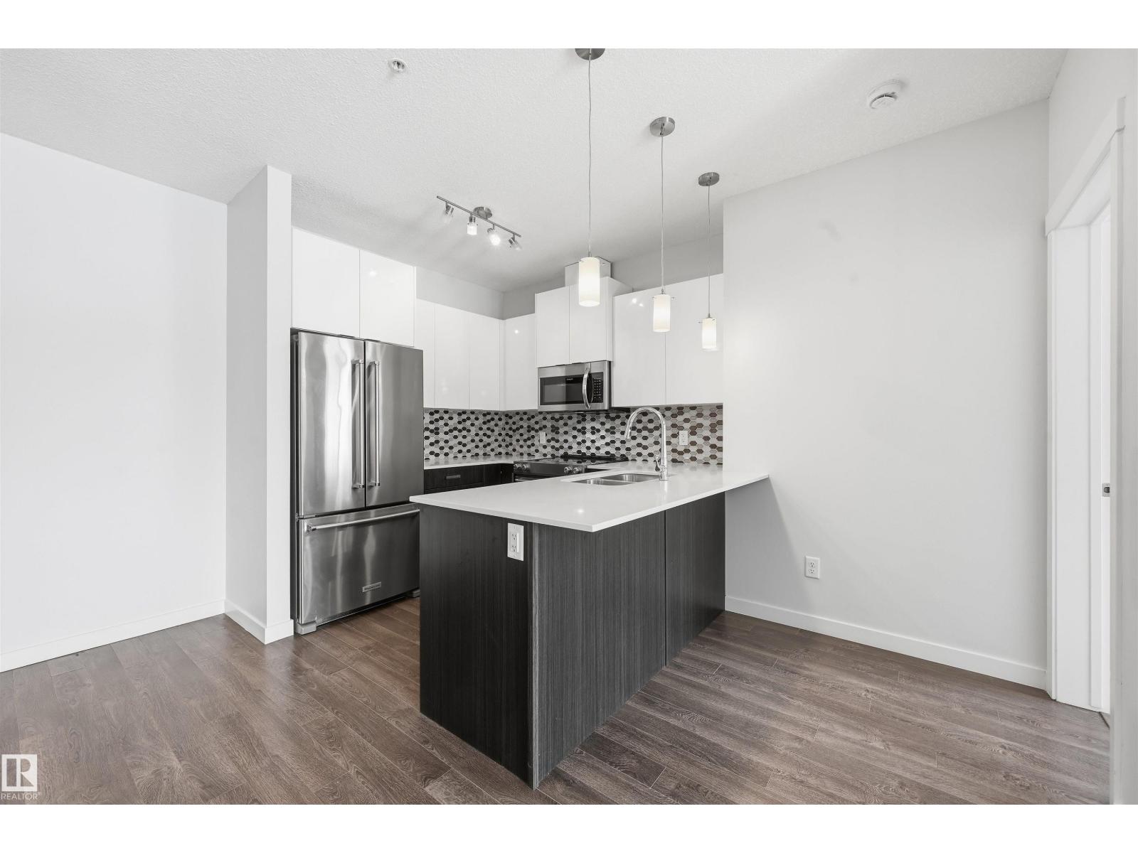 
          106 812 WELSH Drive SW
            <br/>
            <span>Edmonton</span>
            , 
            <span>AB</span>
             <span>T6X1Y7</span>
         - Photo 12