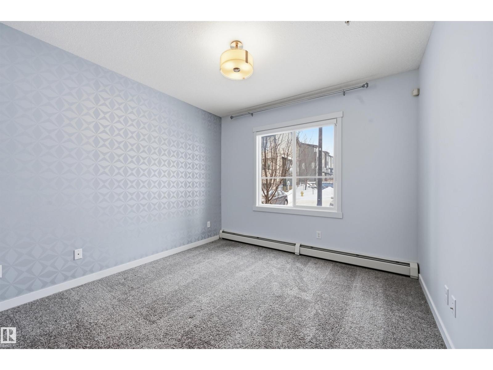 
          106 812 WELSH Drive SW
            <br/>
            <span>Edmonton</span>
            , 
            <span>AB</span>
             <span>T6X1Y7</span>
         - Photo 26