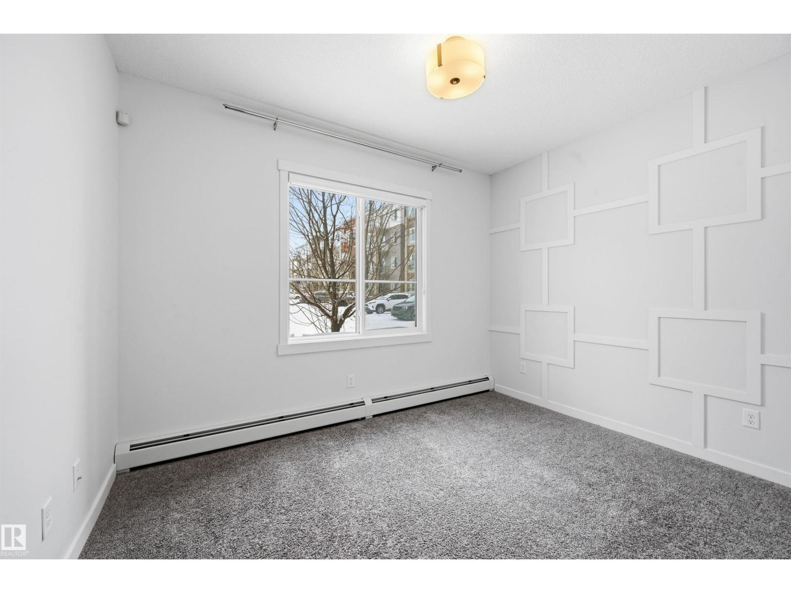 
          106 812 WELSH Drive SW
            <br/>
            <span>Edmonton</span>
            , 
            <span>AB</span>
             <span>T6X1Y7</span>
         - Photo 33