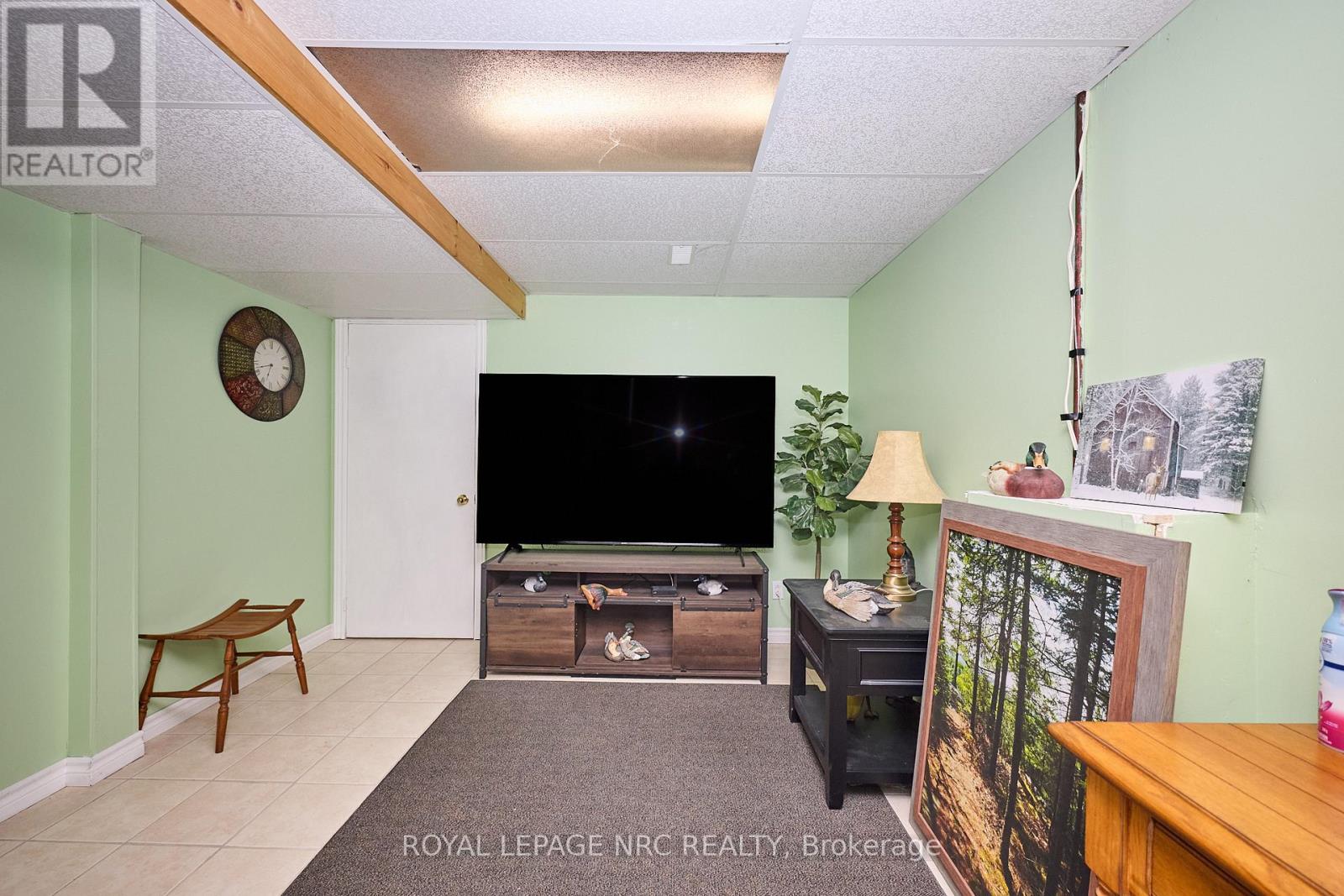 Utility room leading to private workshop.