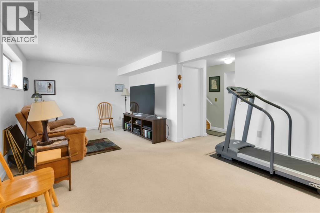 Single Family House Bi-level for Sale in  Coach Manor Rise SW Coach Hill Calgary 