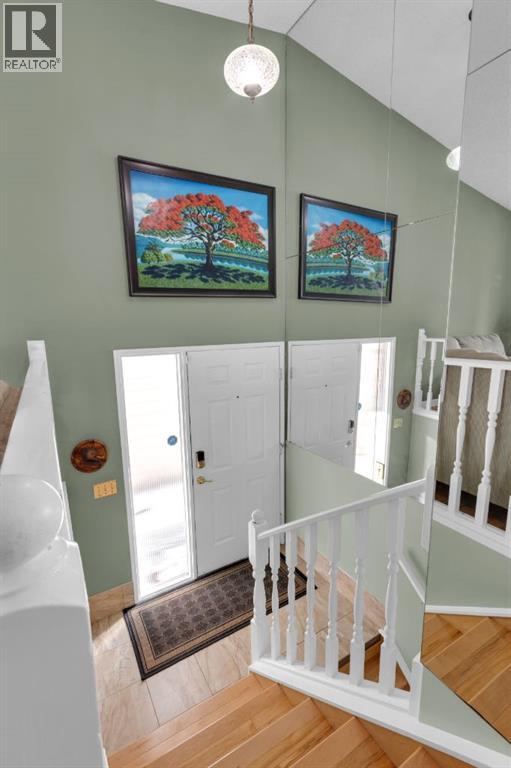 Single Family House Bi-level for Sale in  Coach Manor Rise SW Coach Hill Calgary 