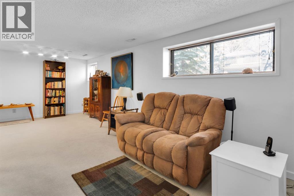 Single Family House Bi-level for Sale in  Coach Manor Rise SW Coach Hill Calgary 