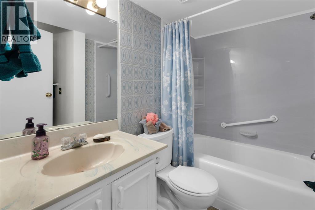 Single Family House Bi-level for Sale in  Coach Manor Rise SW Coach Hill Calgary 