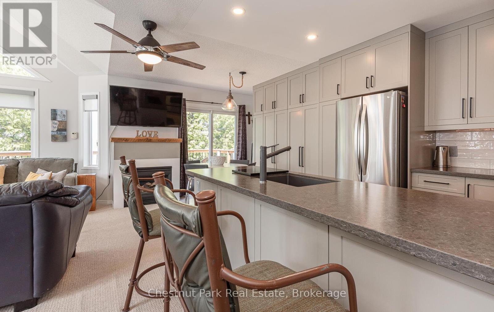 Gourmet chefs kitchen with walk-out to back deck