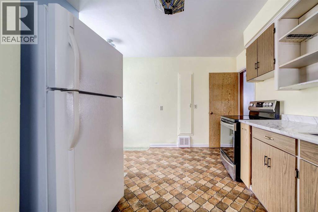 Single Family House Bungalow for Sale in   Street S Glendale Lethbridge 