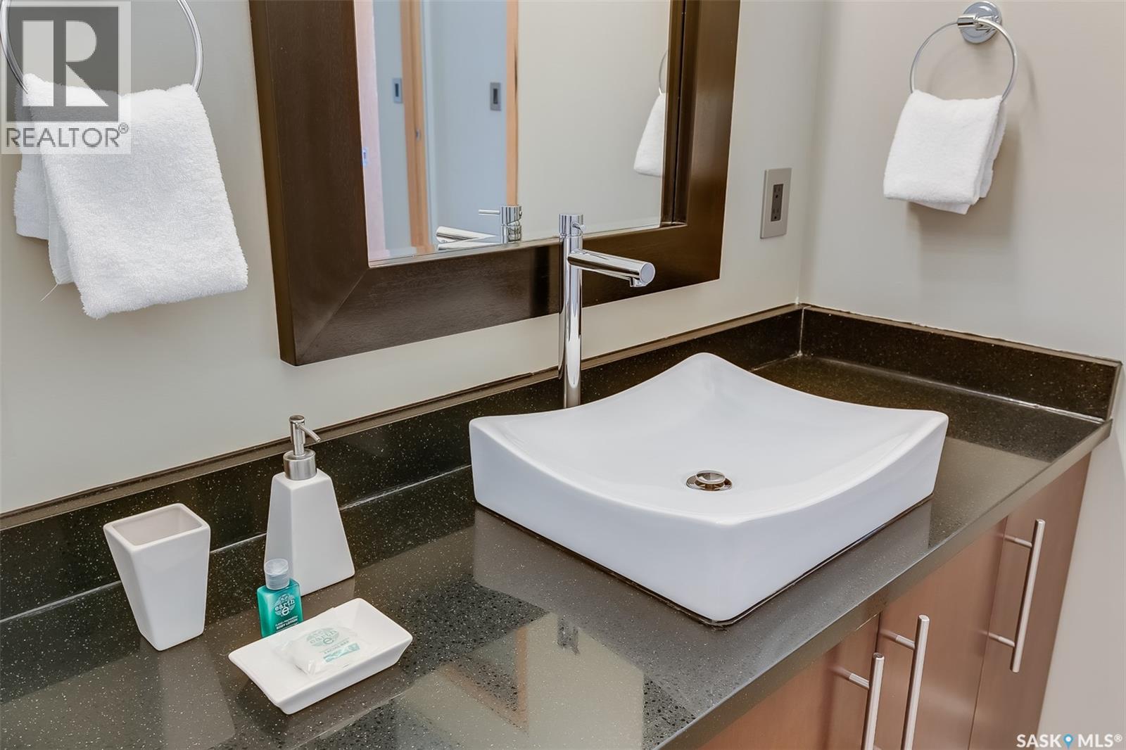 #401 73 24TH STREET E - 24