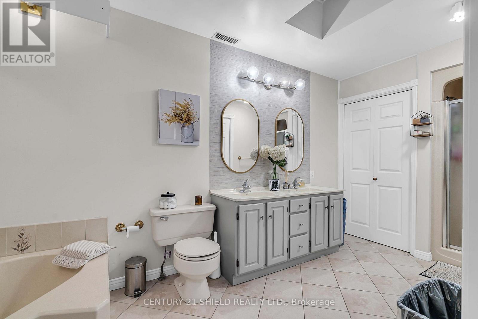 5-pc bathroom with laundry in closet