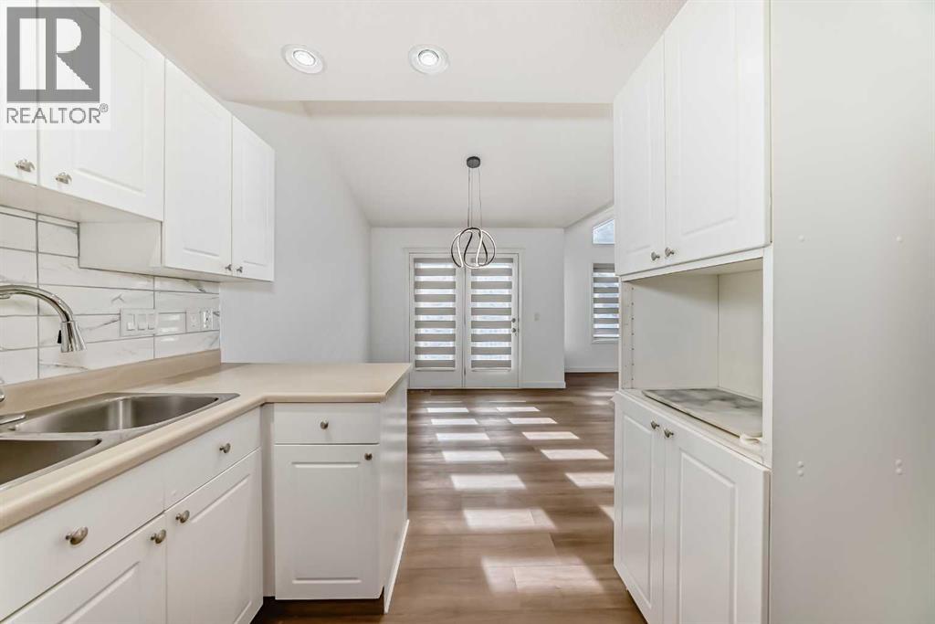 Single Family House Bungalow for Sale in  Del Monica Villas NE Monterey Park Calgary 